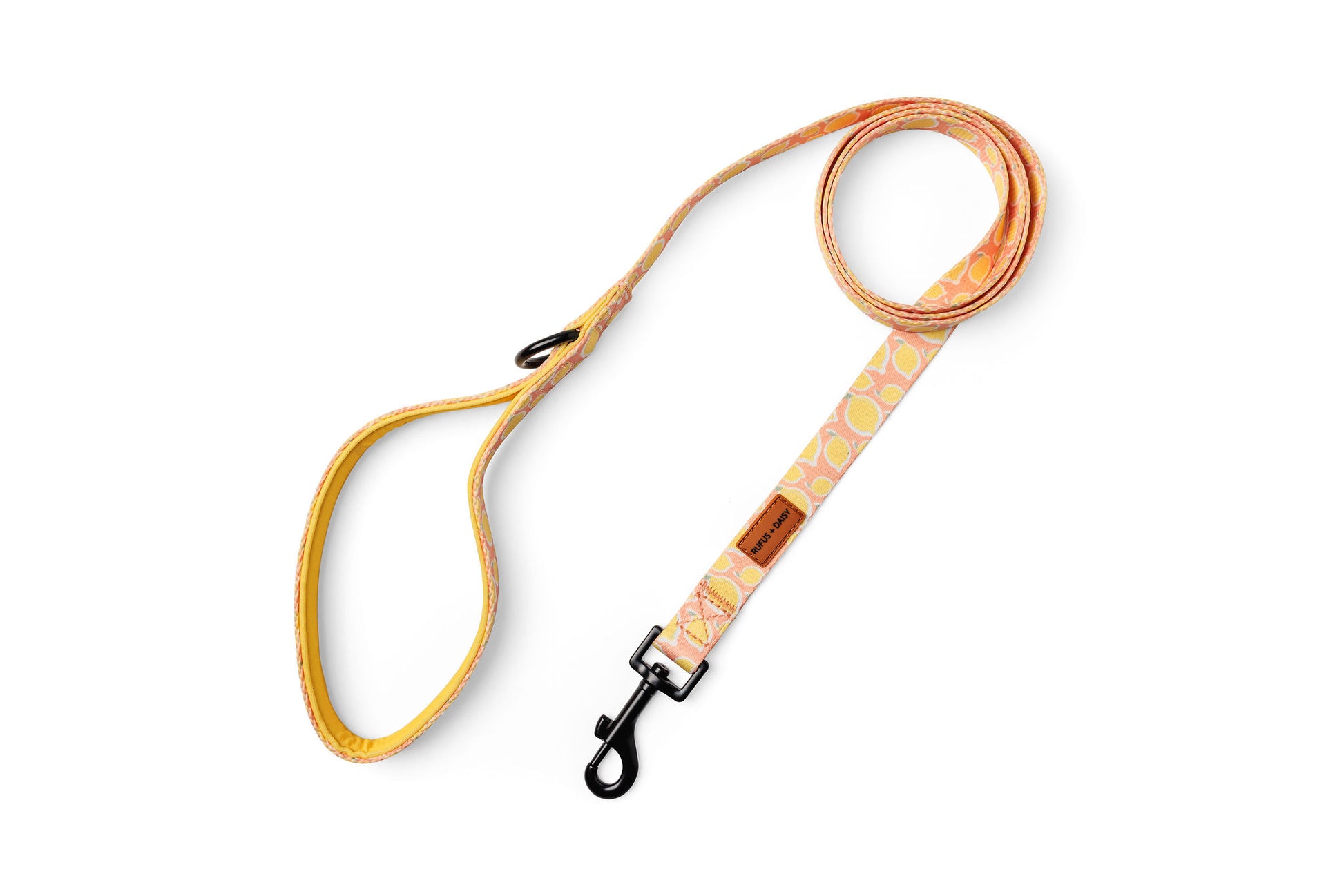 Dog leash with a lemon patterned design on a white background